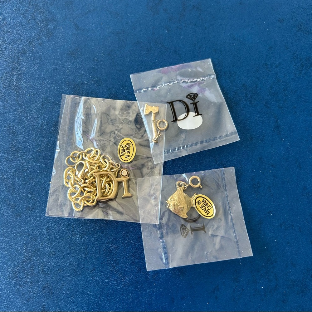 Gold Charm Set with Di Logo